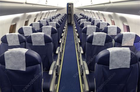 Narrow-body passenger aircraft cabin - Stock Image - C037/8546 - Science Photo Library