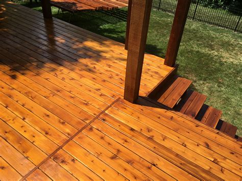 Two tone cedar deck. Cabot Stain Australian Oil. The posts and railing ...