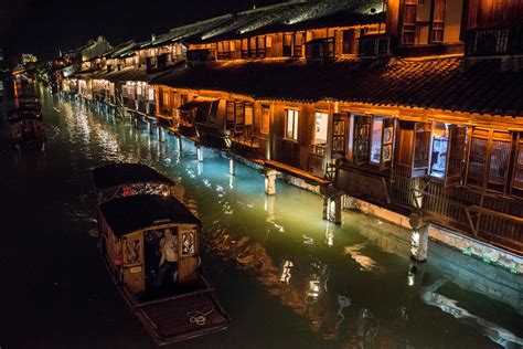 Ancient Town in China Enjoys Profitable Rebirth as a ‘Beautiful Stage’ - The New York Times