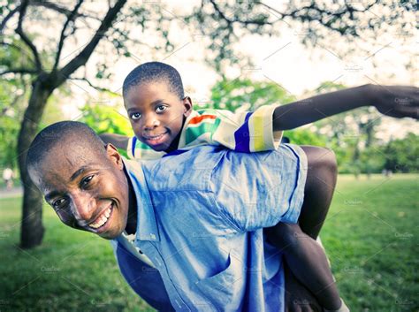 African family enjoying outdoors | Stock Photos ~ Creative Market