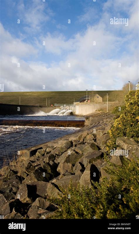 Kielder Water Reservoir Dam stilling basin and weir with water discharging from valves Stock ...