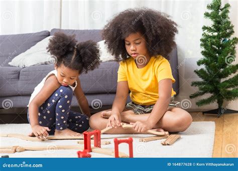 Kids Playing Dolls In Living Room / Free Images : architecture ...