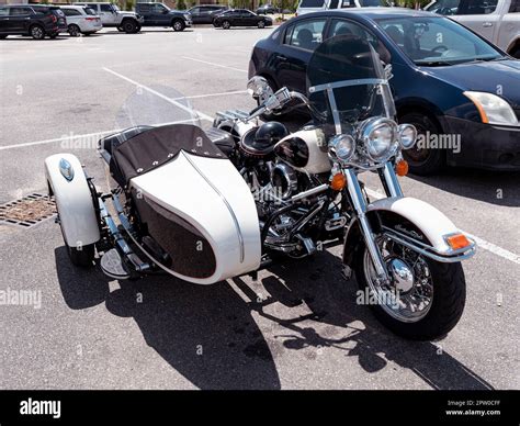 Harley Davidson Heritage Softail motorcycle with a sidecar in a parking ...