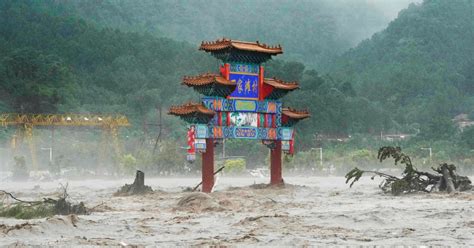 Beijing floods: 20 dead and 27 missing in China rain