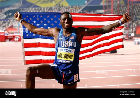 USA’s Grant Holloway celebrates after winning the Men's 110m hurdles final during day six of the ...