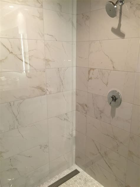 Calcutta Polished porcelain looks just like marble! See it in every ...