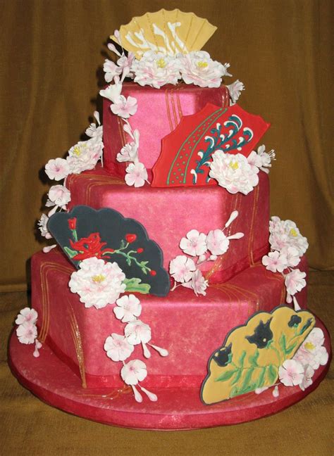 Colette Peters inspired asian fan cake. Fans are run sugar (color flow ...