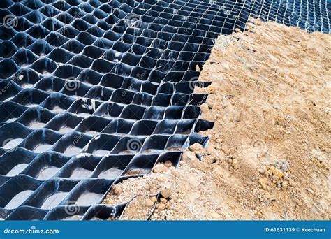 Close Up On Slope Erosion Control Grids On Steep Slope. Stock Photo - Image: 61631139