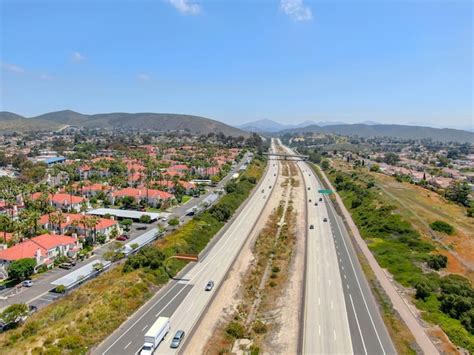 Premium Photo | Aerial view of highway, freeway road with vehicle in ...