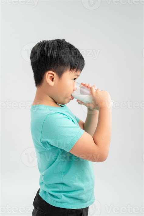 kid drinking milk on white background 11905868 Stock Photo at Vecteezy