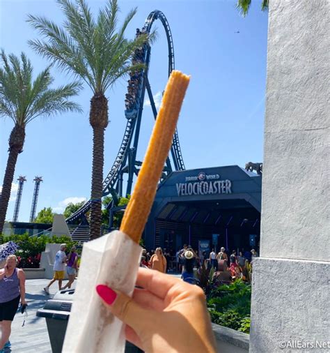 PHOTOS: Universal's VelociCoaster IS a Churro Stand For Its Opening Day - AllEars.Net