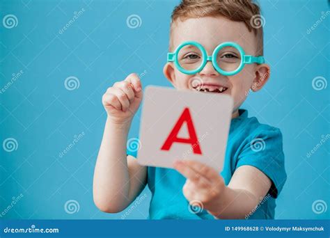 Cute Little Boy With Letter On Background. Child Learn Letters. Alphabet Stock Photo - Image of ...