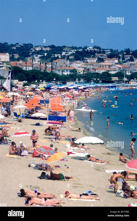 Sainte Ste. Maxime Beach and town Var South of France people sunbathing ...