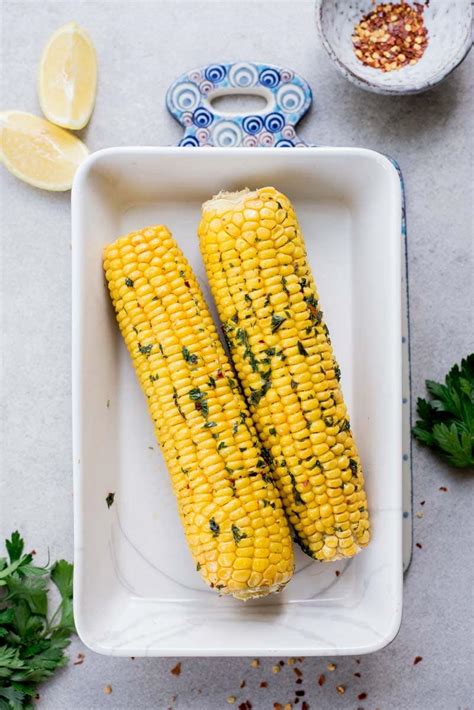 Oven-roasted corn on the cob with herb and chili butter - Everyday Delicious