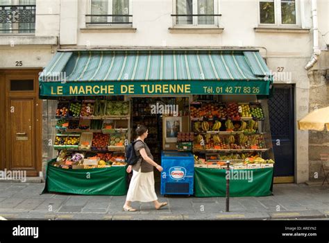 Small local grocery shop with fruit and vegetables under its awning in ...