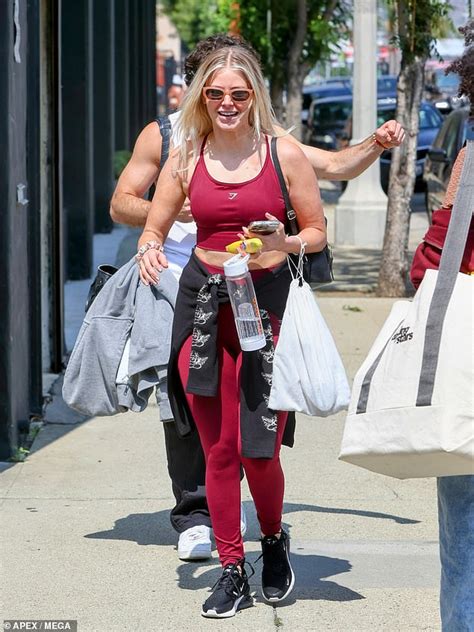 Ariana Madix looks fit in red workout outfit as she heads to dance ...