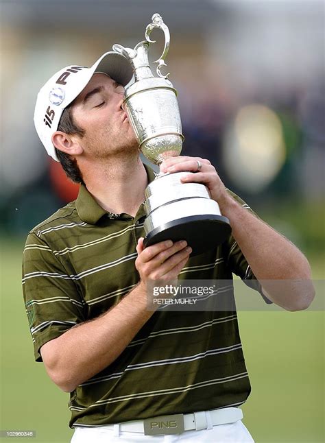 South African golfer Louis Oosthuizen kisses the Claret Jug, the ...