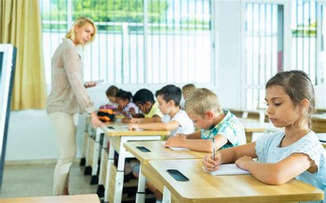 Group of Focused Kids Working at Class Stock Photo - Image of lesson ...