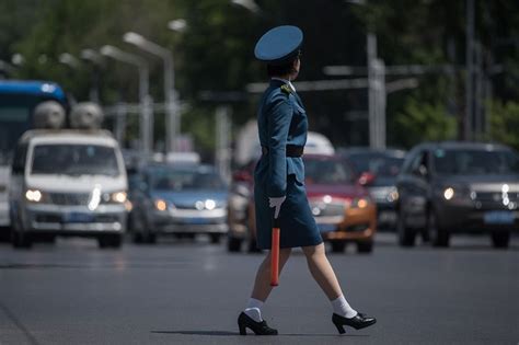 Driven to distraction: Pyongyang's 'traffic ladies' | ABS-CBN News