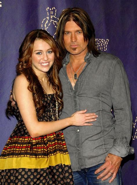 ** FILE ** In this April 14, 2008 file photo, Miley Cyrus and her ...