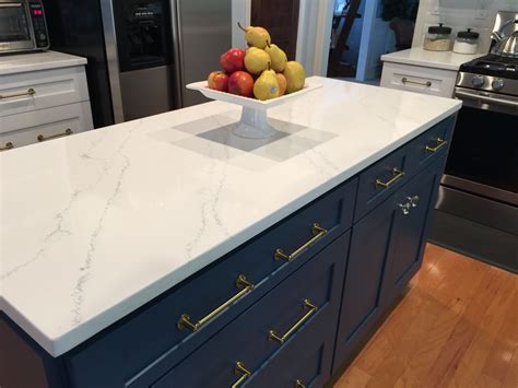 Countertops: Quartz, Hanson Tranquility. #WhiteCounterTops #WhiteKitchens #BlueCabine… | Kitchen ...