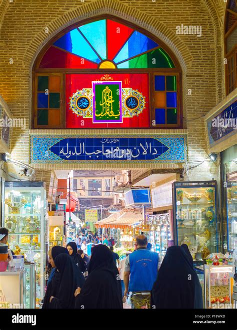 TEHRAN, IRAN - MAY 22, 2107: People at Tehran Grand Bazaar. The Grand Bazaar is an old ...