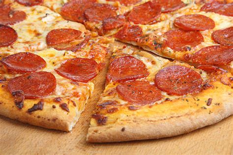 Pepperoni Pizza Pictures, Images and Stock Photos - iStock