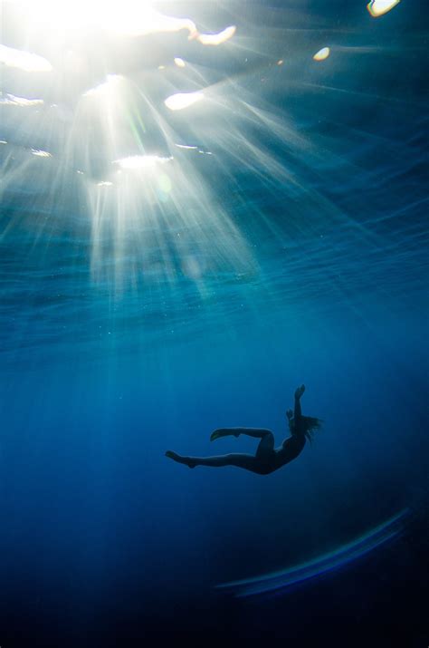 girl dives underwater | Underwater photography, Water photography, Water art