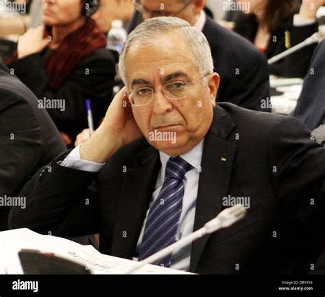 Palestinian Prime Minister Salam Fayyad attends a meeting of the Ad Hoc ...