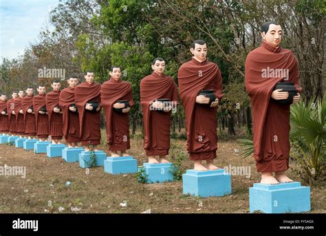 Row of statues of the 500 Arahant followers of Buddha at Win Sein Taw Ya, Mudon near Mawlamyine ...