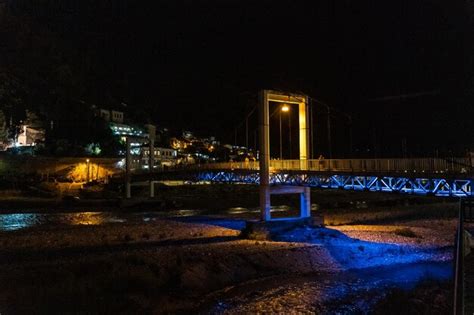 Premium Photo | Illuminated bridge of the historic city of berat in ...