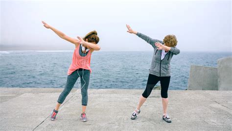 Women making dab dance outdoors stock photo (194555) - YouWorkForThem