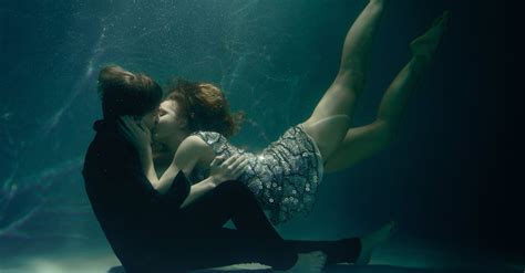 A Couple Kissing Underwater · Free Stock Photo