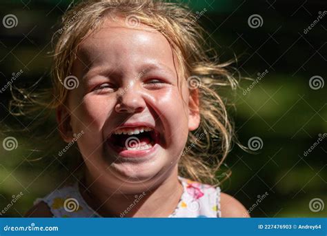 The Child is Crying and Laughing, the Child is Hysterical Stock Image ...