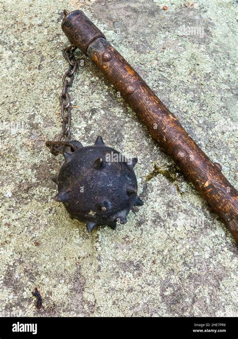 Close up of Mace Weapon's Spiked Ball, Chain and Shaft Stock Photo - Alamy