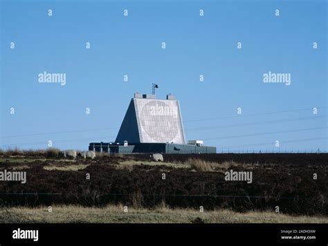 Fylingdales early-warning radar base surrounded by grazing sheep. This Royal Air Force (RAF ...