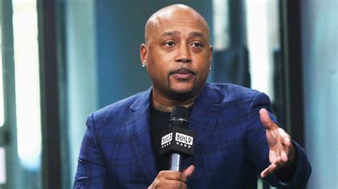 FUBU CEO Daymond John advises students on how to swim with the sharks ...