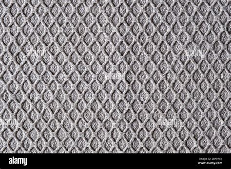 beige colored woven fabric with diamond pattern Stock Photo - Alamy