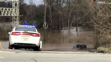 GALLERY: Flooded Ocmulgee River claims SUV in downtown Macon | WGXA