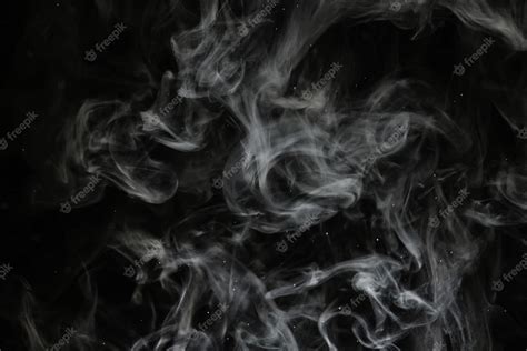 Premium Photo | Texture smoke on a black background abstract