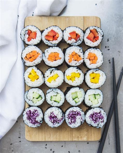 sushi and rainbows 💖 filled with red pepper, carrots, yellow pickled ...