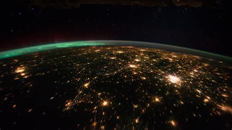 Planet Earth Night View with Aurora Borealis and City Lights