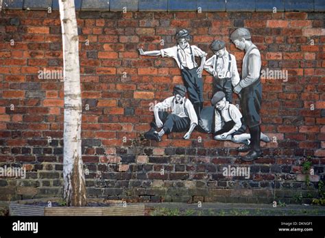 Exterior wall art on a brick wall in Ranelagh Road,Weymouth,Dorset Stock Photo - Alamy