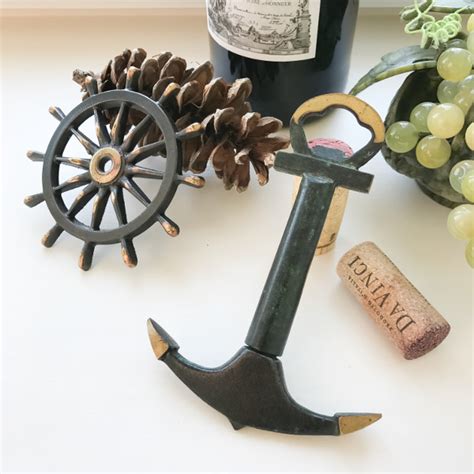 Collectible corkscrew set in the shape of an anchor with helm