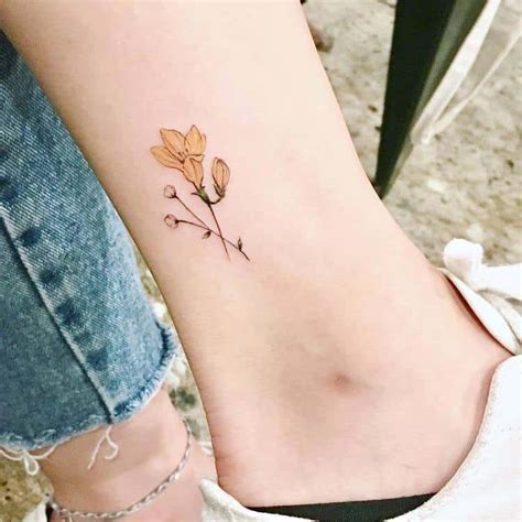 22 Beautiful and Delicate Freesia Tattoo Designs | TattooAdore