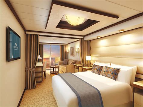 Guests staying in a Mini Suite aboard Royal Princess are given a separate sitting area and ...