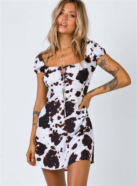 Everything You Need to Know About the Cow Print Outfit Trend