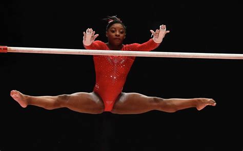 Spring's Simone Biles wins third straight world all-around gymnastics title