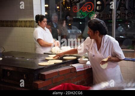 Women make hand made tortillas at the Old Town Mexican Cafe, Old Town ...