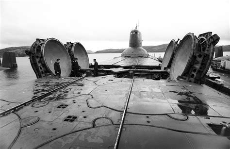 Akula/Typhoon class SSBN with open missile tube hatches : r/HumanForScale